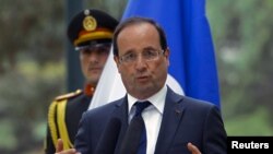French President Francois Hollande speaks during a news conference in Kabul, May 25, 2012 (Reuters).
