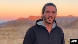 FILE - An undated handout picture obtained from the lawyer of Benjamin Briere, a French man arrested last year in Iran on espionage charges, shows Briere at an unnamed location. 