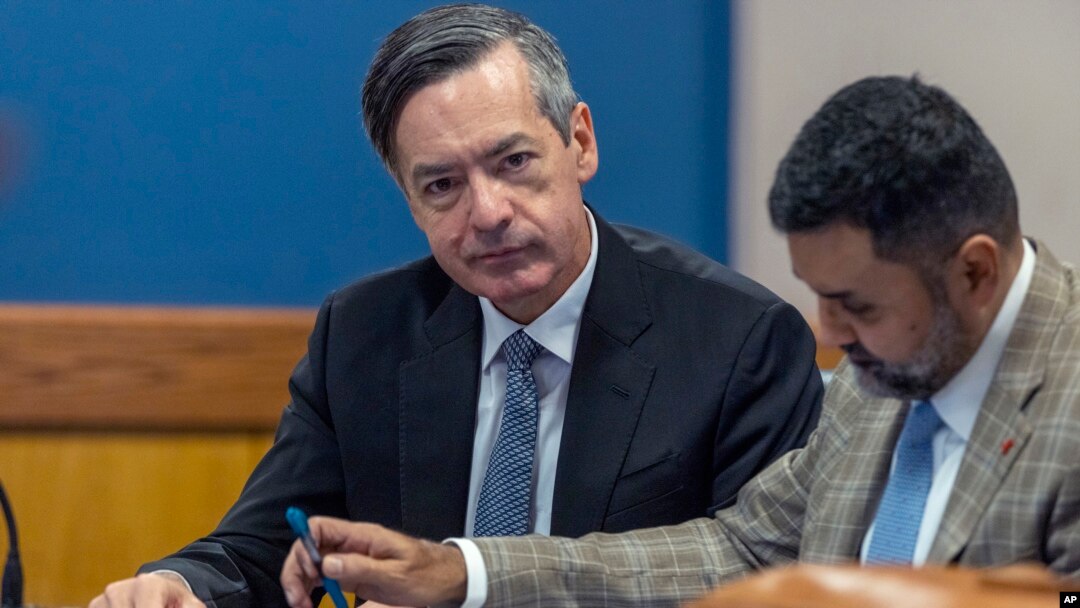 Kenneth Chesebro sits with his attorney, Manny Arora, during a hearing at which Chesebro accepted a plea deal at the Fulton County Courthouse on Oct. 20, 2023, in Atlanta, Georgia.