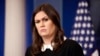 White House press secretary Sarah Huckabee Sanders listens to a question during the daily press briefing at the White House in Washington, Dec. 5, 2017.