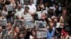 Demonstrators protest jailing of two journalists and an academic, outside the offices of Ozgur Gundem, a pro-Kurdish publication, Istanbul, June 21, 2016.
