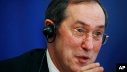 FILE - Claude Gueant speaks during a news conference at Bulgaria's Council of Ministers, in Sofia, Apr. 18, 2011. 