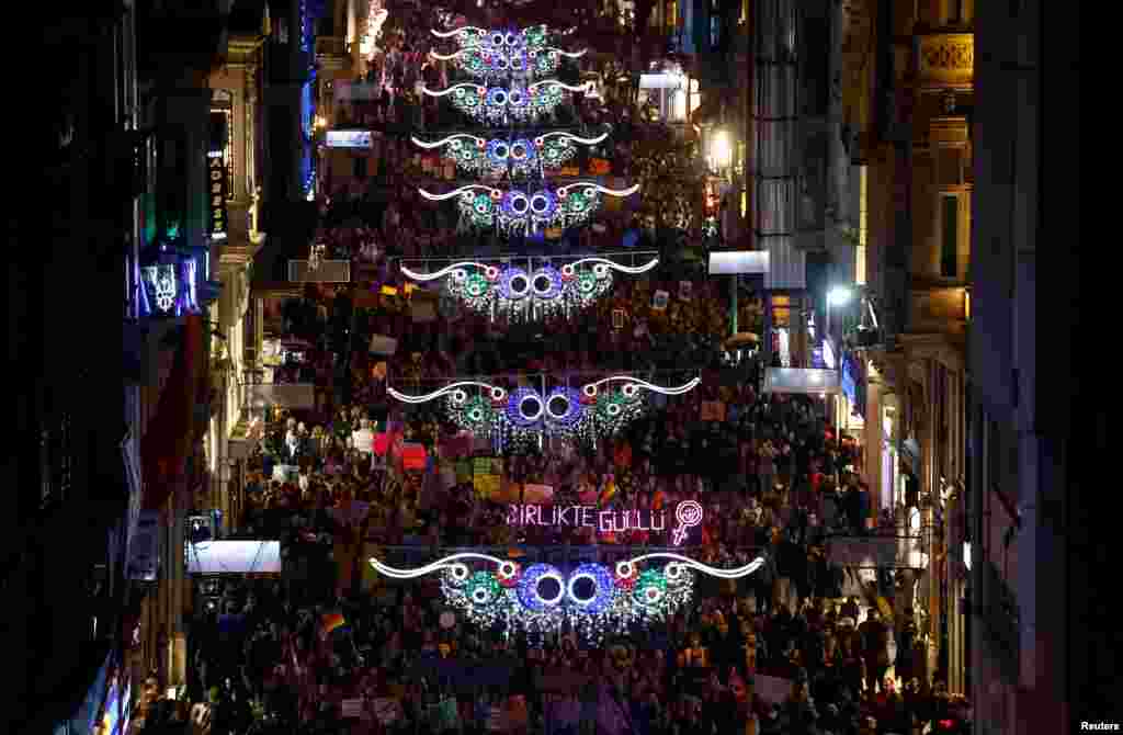 Activists march on the main shopping and pedestrian street of Istiklal during an International Women's Day rally in central Istanbul, Turkey, March 8, 2017.