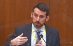 FILE - In this image from video, Seth Stoughton, testifies in the trial of former Minneapolis police Officer Derek Chauvin, at the Hennepin County Courthouse in Minneapolis, Minn., April 12, 2021. (Court TV via AP, Pool)