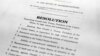 FILE - A copy of a page of the articles of impeachment is seen in Washington, Dec. 10, 2019.