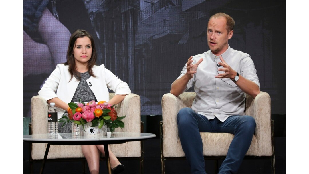 FILE - Director/producer/cinematographer Waad al-Kateab, left, and director Edward Watts participate in PBS's "For Sama" panel at the Television Critics Association Summer Press Tour in Beverly Hills, Calif., July 30, 2019.