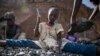 FILEIrene Wanzila, 10, works breaking rocks with a hammer at the Kayole quarry in Nairobi, Kenya, Sept. 29, 2020, along with her younger brother, older sister and mother.