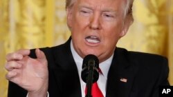 FILE - President Donald Trump speaks during a news conference, Feb. 16, 2017, in the East Room of the White House in Washington. 