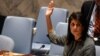 U.S. Ambassador to the U.N. Nikki Haley votes for a draft resolution condemning the reported use of chemical weapons in Syria at the Security Council meeting on the situation in Syria at the United Nations Headquarters in New York, April 12, 2017. 