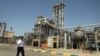 Petrochemical plant at an Iranian port. (2011 photo) New sanctions target Iran's oil-dependent economy