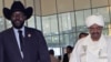 Sudan's President Omar al-Bashir welcomes his South Sudanese counterpart Salva Kiir for his first visit since southern secession to discuss key unresolved issues that have undermined north-south relations, during his arrival at Khartoum Airport, Sudan, Oc