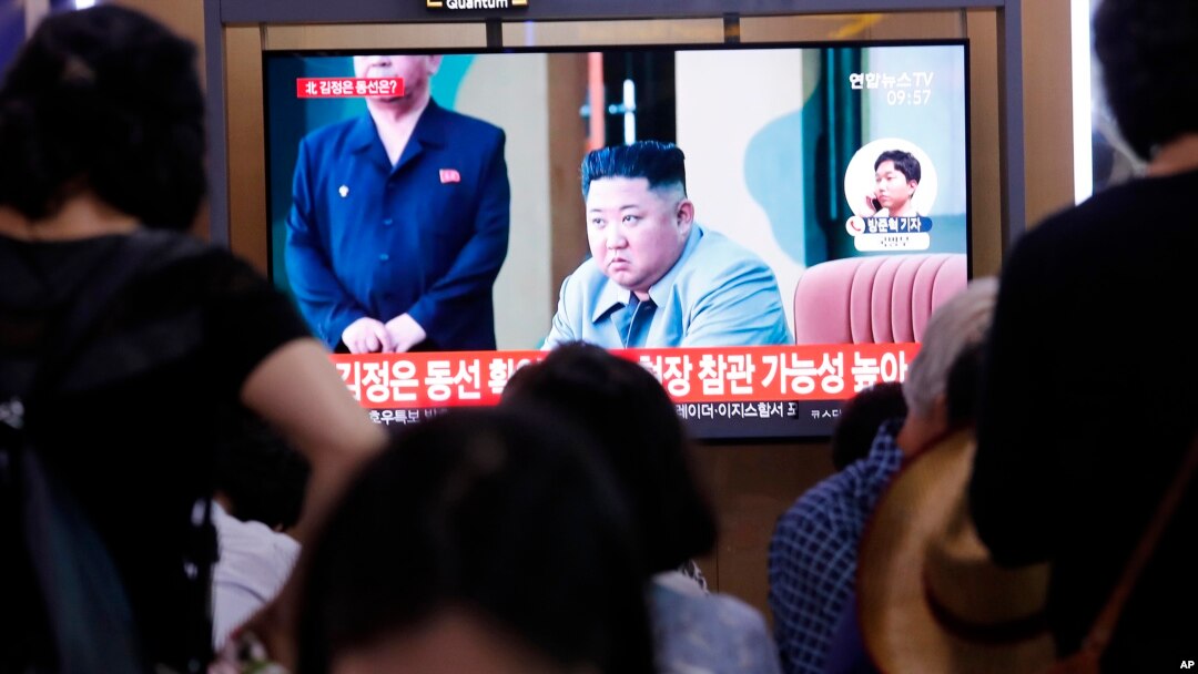 People watch a TV showing a file image of North Korean leader Kim Jong Un during a news program at the Seoul Railway Station in Seoul, South Korea, Wednesday, July 31, 2019. 