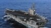 FILE - USS Ronald Reagan is directed to Japan following a 8.9 earthquake and tsunami to render humanitarian assistance and disaster relief, March 12, 2011.