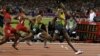 Jamaica's Usain Bolt, right, wins the men's 100-meter final during the athletics in the Olympic Stadium at the 2012 Summer Olympics, London, Sunday, Aug. 5, 2012.