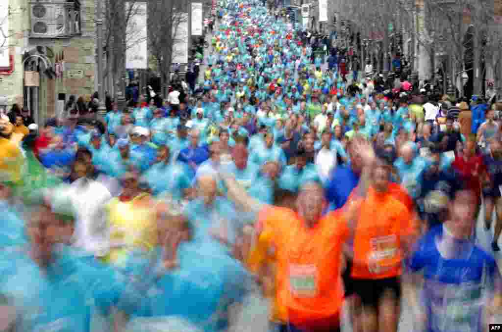 Competitors take part in the 7th International Jerusalem Marathon, outside Jerusalem's Old City, Israel.