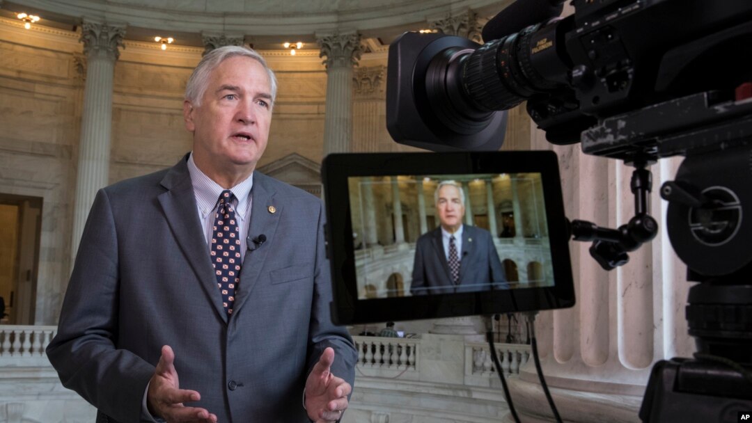 FILE - Sen. Luther Strange, R-Ala., responds to questions during a TV news interview on Capitol Hill in Washington, July 11, 2017. 
