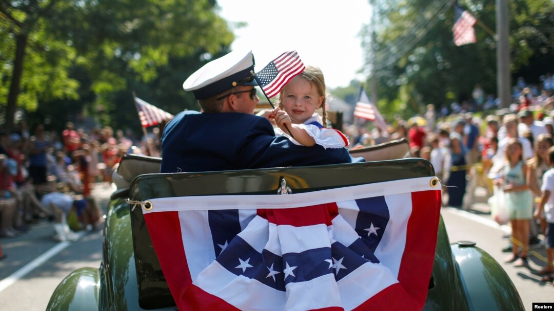 Michael Mays, left, of Cockeysville, Md., and Samuel Koch, of Reisterstown, Md., watch the firework display during the Baltimore County Independence Extravaganza, Wednesday, July 3, 2019, in Cockeysville.