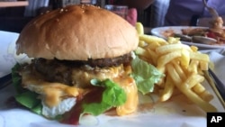 A combination hamburger served in Pyongyang, North Korea, June 12, 2018. A new Australian study links fast food to dementia.