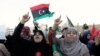 FILE - Demonstrators protest against what they say is French military intervention in Libya, at Martyrs Square in Tripoli, Libya, July 22, 2016.