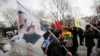 FILE - Demonstrators wave flags with the image of imprisoned Kurdish rebel leader Abdullah Ocalan during a rally in Istanbul, Feb. 15, 2015. 