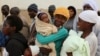 FILE - Zimbabwean women.