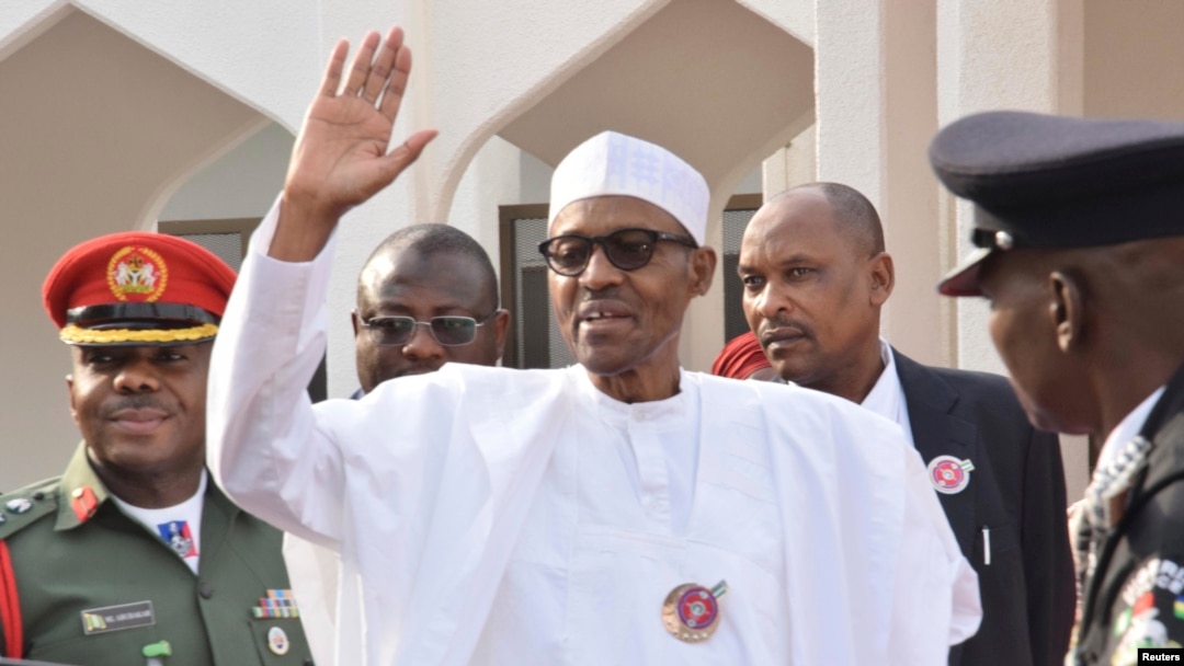 FILE - Nigeria President Muhammadu Buhari, waves after a meeting in Abuja, Nigeria, Jan. 9, 2017. Buhari is now in London on nearly a month-long medical leave.