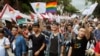 Same-sex marriage supporters cheer after the Constitutional Court ruled in favor of same-sex marriage outside the Legislative Yuan in Taipei, Taiwan, May 24, 2017. Taiwan's Constitutional Court ruled in favor of same-sex marriage Wednesday, making the island the first place in Asia to recognize gay unions. 