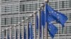In this Monday, May 9, 2011 file photo, EU flags fly at the European Commission headquarters in Brussels. . The European Union has won the Nobel Peace Prize, it has been announced on Friday, Oct. 12, 2012. 
