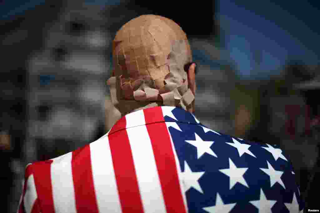 Mike Stutz is seen with his head covered in band aids to protest against President Donald Trump's proposed replacement for Obamacare, in Los Angeles, California, March 14, 2017.