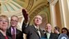 Senate Majority Leader Harry Reid, center, leads Senate Democrats' news conference on Capitol Hill, March 1, 2012.