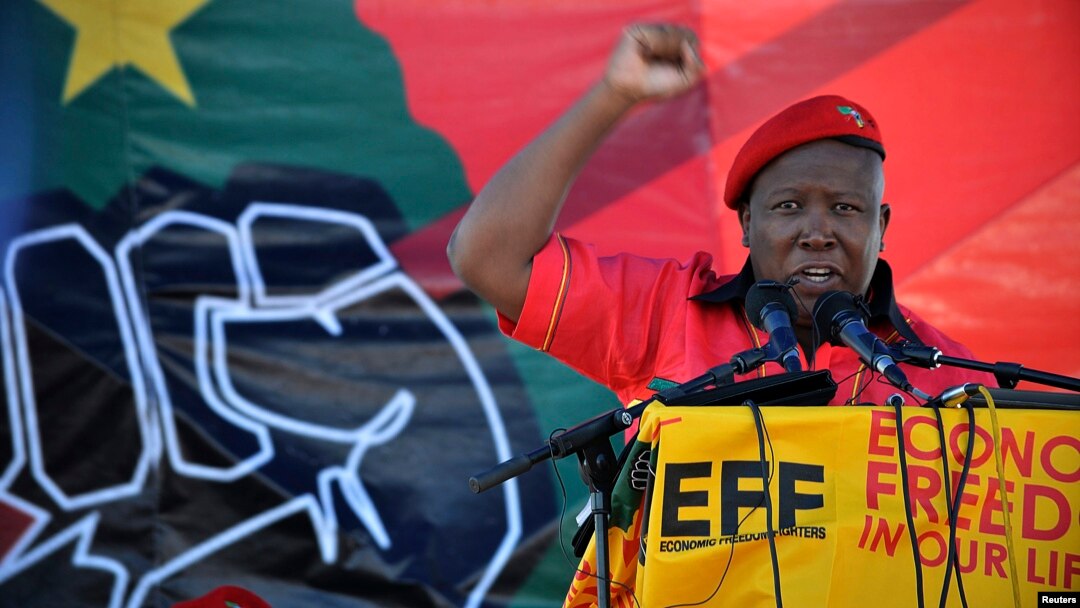 Julius Malema, leader of the Economic Freedom Fighters, gestures as he addresses supporters during the official launch of his political party in Marikana October 13, 2013.