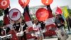 Youths protest during a rally organized by the opposition Social Democratic Party (SPD) and labour unions outside the venue of an EU summit on youth unemployment in Berlin, Germany, July 3, 2013. 