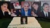 Pictures of Lebanon's assassinated former prime minister Rafik al-Hariri are seen at his grave site in downtown Beirut, Jan. 16, 2014. 