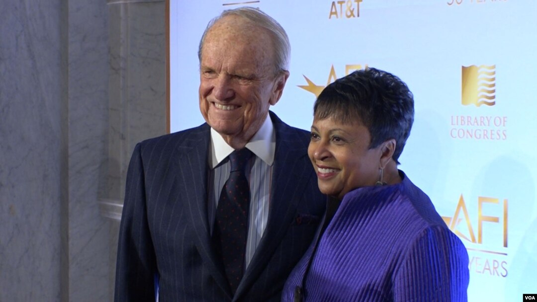 American Film Institute founder George Stevens (L) and Librarian of Congress Carla Hayden are seen at an event in Washington marking 50 years of partnership in film preservation between the two institutions.