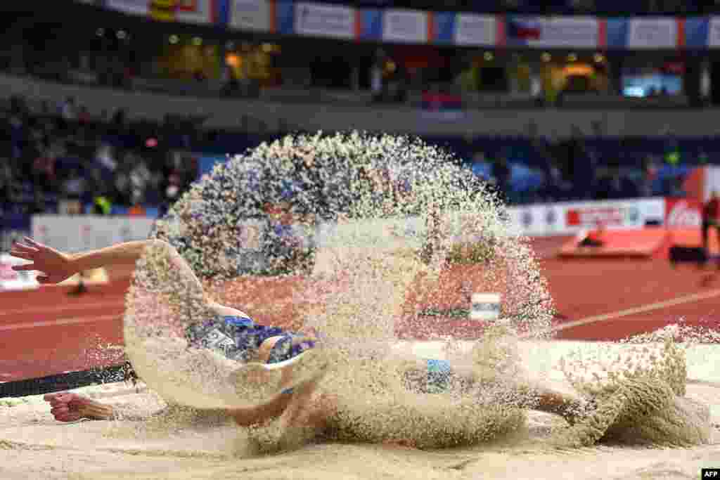 Estonia's Henrik Kutberg competes in the men's long jump qualifications at the 2017 European Athletics Indoor Championships in Belgrade, Serbia.