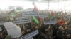 Members of the Libyan National Army rally to call for the National Transitional Council to stop marginalizing the role of the national army in Benghazi, Libya, March 4, 2012. 