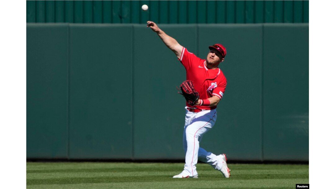 Los Angeles Angels center fielder Mike Trout (27) throws the ball in against the San Francisco Giants in the fourth inning at Tempe Diablo Stadium, Tempe, Arizona, Feb. 27, 2023. Rick Scuteri-USA TODAY Sports