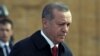 Turkish President Recep Tayyip Erdogan walks to the mausoleum of Turkey's founder Mustafa Kemal Ataturk on Republic Day in Ankara, Oct. 29, 2015.