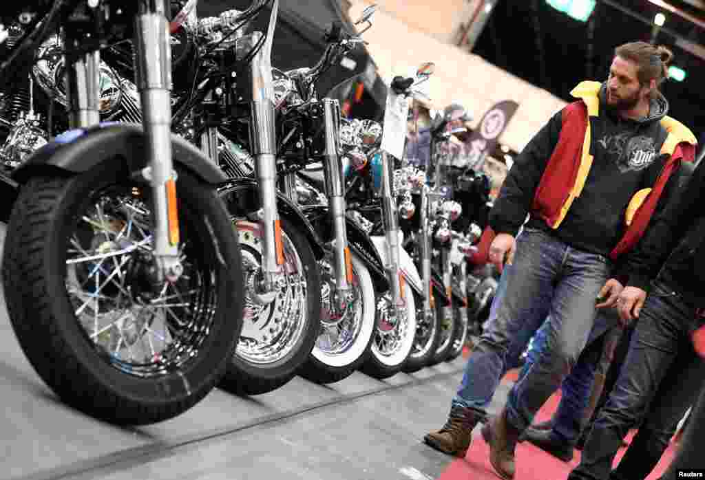 Harley-Davidson bikes are lined up at a bike fair in Hamburg, Germany.
