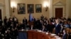Former White House national security aide Fiona Hill and David Holmes, a U.S. diplomat in Ukraine, are sworn in before testifying before the House Intelligence Committee on Capitol Hill in Washington, Nov. 21, 2019, during a public impeachment hearing.
