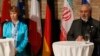 EU foreign policy chief Catherine Ashton (L) and Iranian Foreign Minister Mohammad Javad Zarif attend a news conference in Vienna, July 18, 2014.