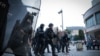 French riot police officers patrol during a demonstration in Caen, north-western France on June 30, 2023, after the shooting of a teenage driver by French police in a Paris suburb on June 27.