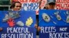 Environmental activists picket the Chinese Consulate to protest alleged military buildup by China on the disputed group of islands at the South China Sea, in Manila, Philippines, Jan. 24, 2017. The protesters condemned China's alleged installation of missile system across the disputed Spratlys group of islands.