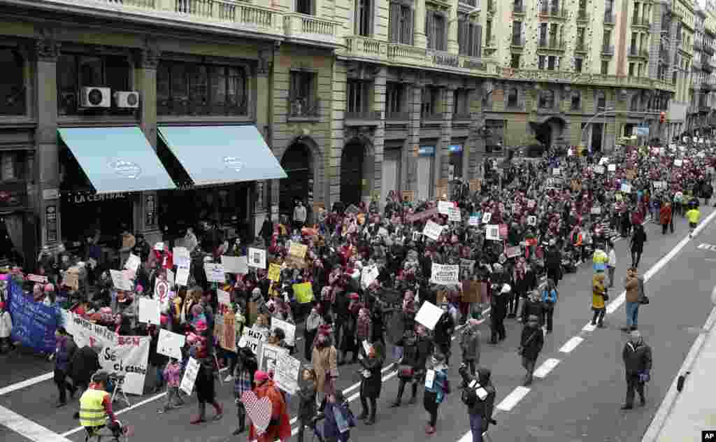 People take part during the Women's March rally in Barcelona, Spain, Jan. 21, 2017.