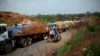 FILE - A convoy of over 100 trucks arriving in the Central African Republic capital, Bangui, from Cameroon.