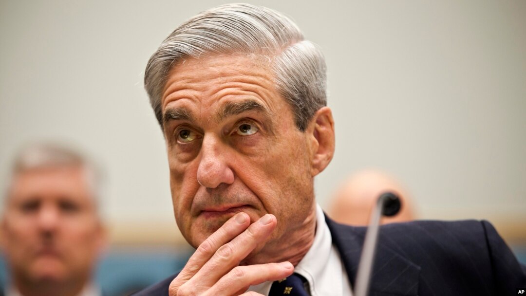 FILE - Then-FBI Director Robert Mueller testifies on Capitol Hill in Washington, June 13, 2013.