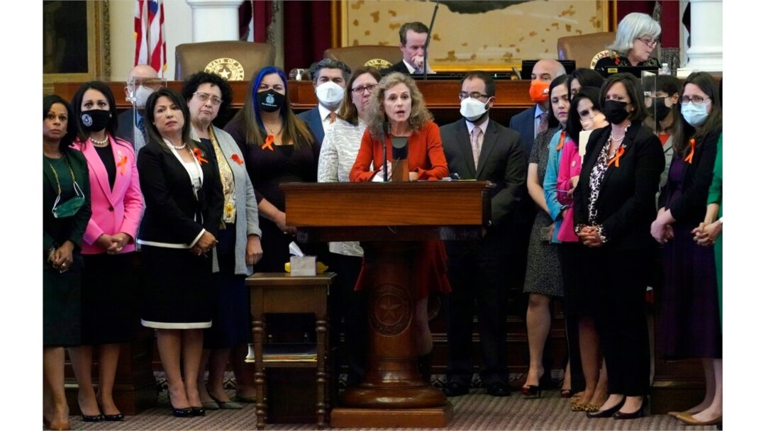 FILE - Texas state Rep. Donna Howard, D-Austin, center, speaks against a bill that would ban abortions as early as six weeks and allow private citizens to enforce it through civil lawsuits, in the House Chamber in Austin, Texas, May 5, 2021.