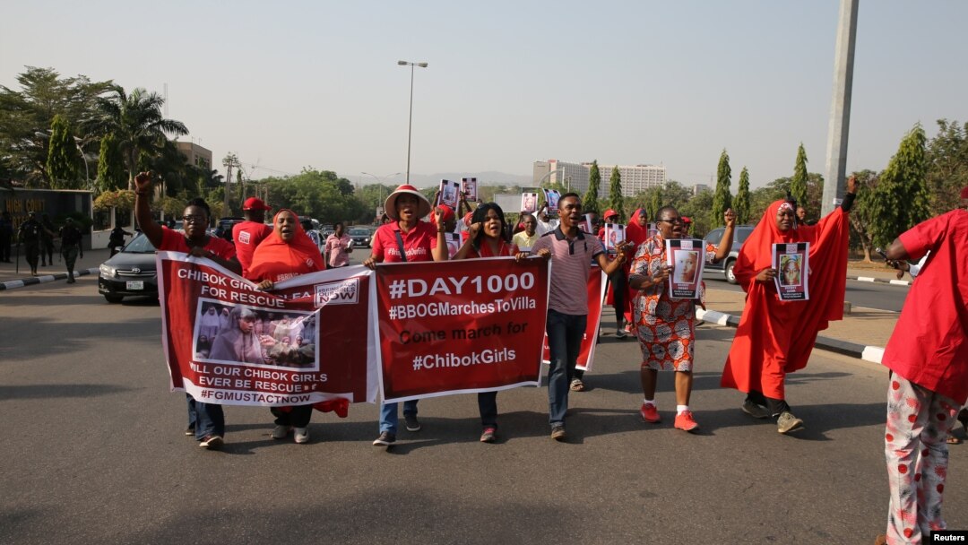 Members of the #BringBackOurGirls campaign rally in Nigeria's capital Abuja to mark 1,000 days since over 200 schoolgirls were kidnapped from their secondary school in Chibok by Boko Haram, Jan. 8, 2017. 
