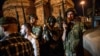 Turkish solders stay with weapons at Taksim Square as people protest against the military coup in Istanbul, July 16, 2016. 