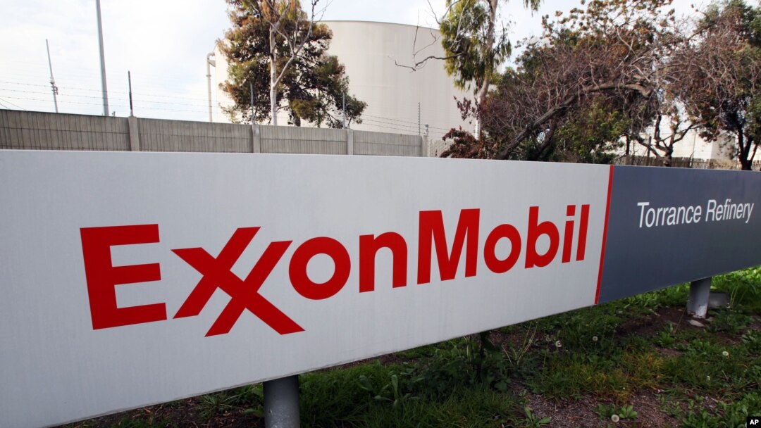 FILE - A sign for the ExxonMobil refinery in Torrance, California, Jan. 30, 2012. Integrated oil companies such as Exxon, Chevron, BP and Royal Dutch Shell could be hit by a reform plan that would tax imports.
